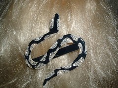 BLACK WHITE AND RHINESTONE WINDING SNAKE LUCITE HAIR CLIP NEW W TAGS