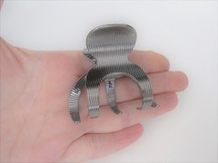 Medium shiny silver tone textured metal hair claw clip