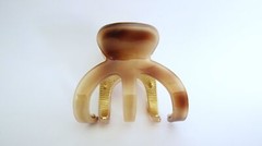 Medium brown beige gold tone textured acrylic and metal hair claw clip